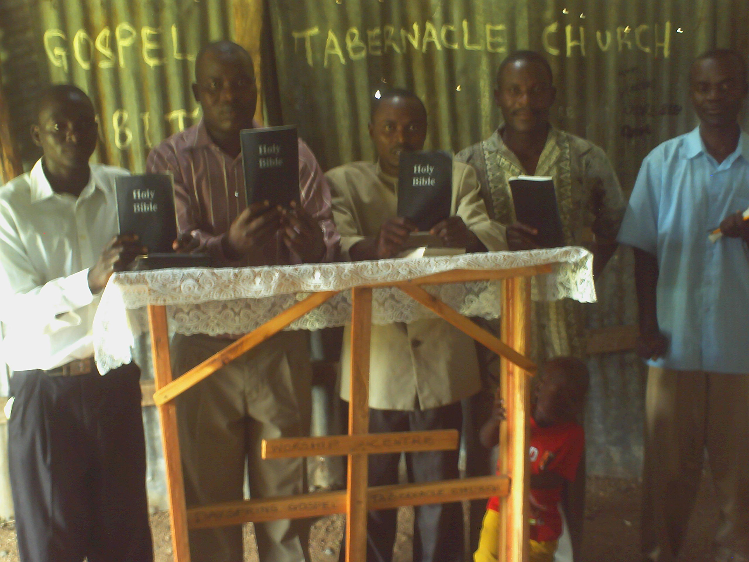 Church members with new Bibles